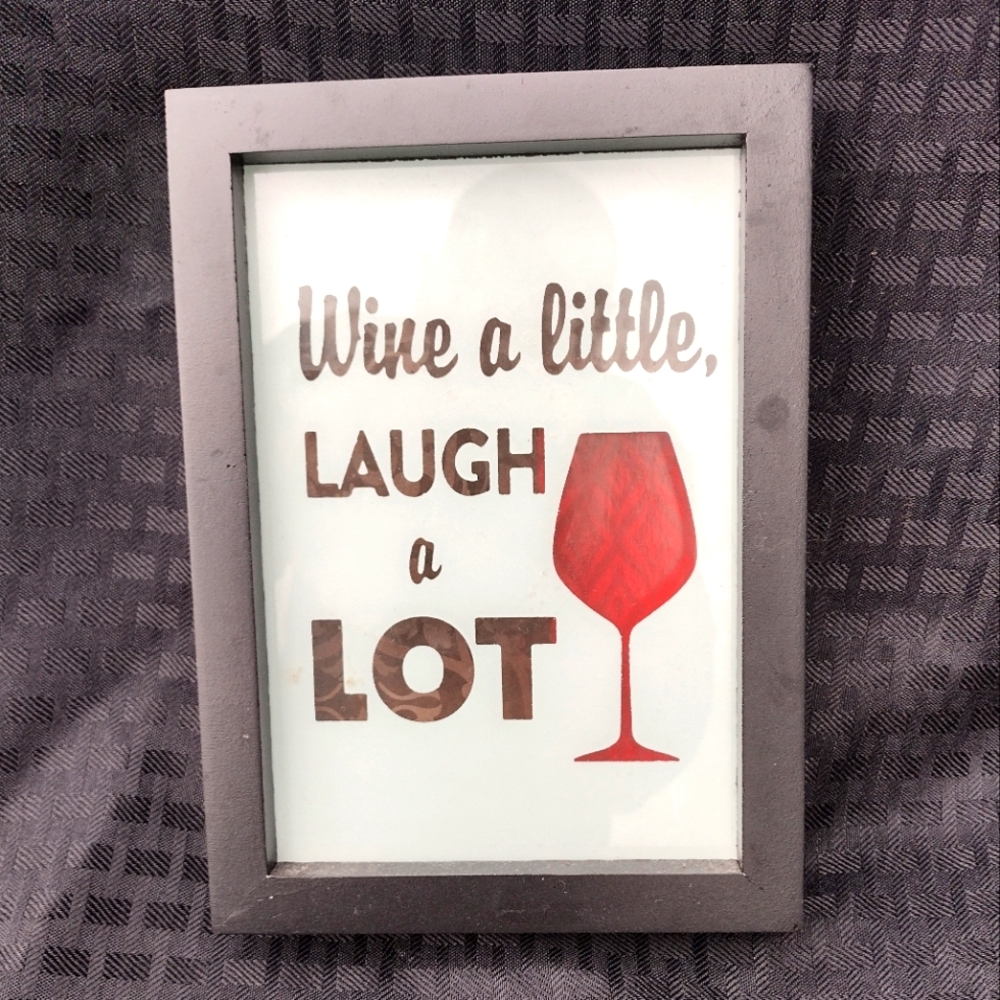 WINE a LITTLE, LAUGH a LOT countertop sign